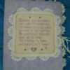 cross stitched baby poem album